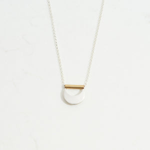 
                  
                    Crescent Moon Pendant  | Silver + Brass
                  
                