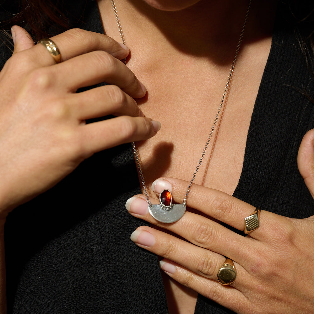 
                      
                        garnet_pendant
                      
                    
