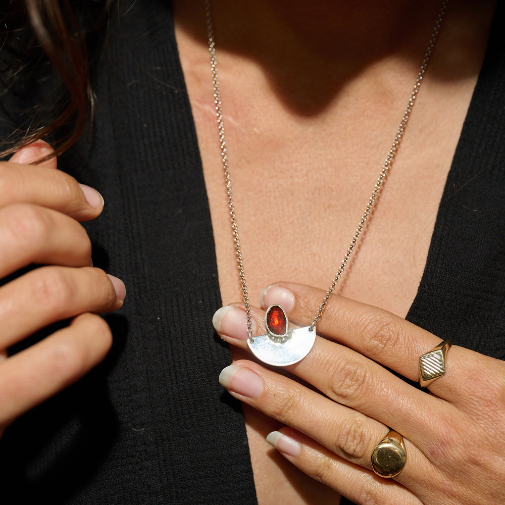 
                      
                        garnet_stone_silver_pendant
                      
                    