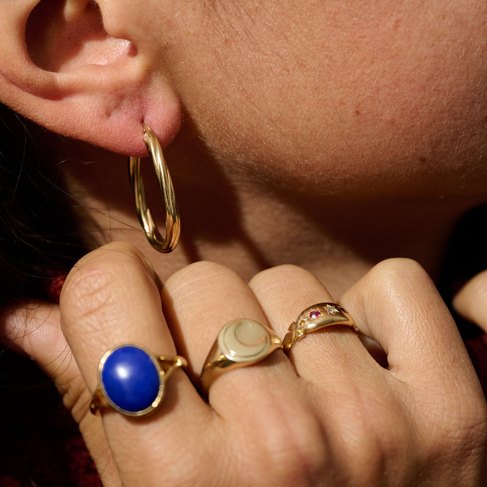 
                      
                        VINTAGE Twist Hoops
                      
                    