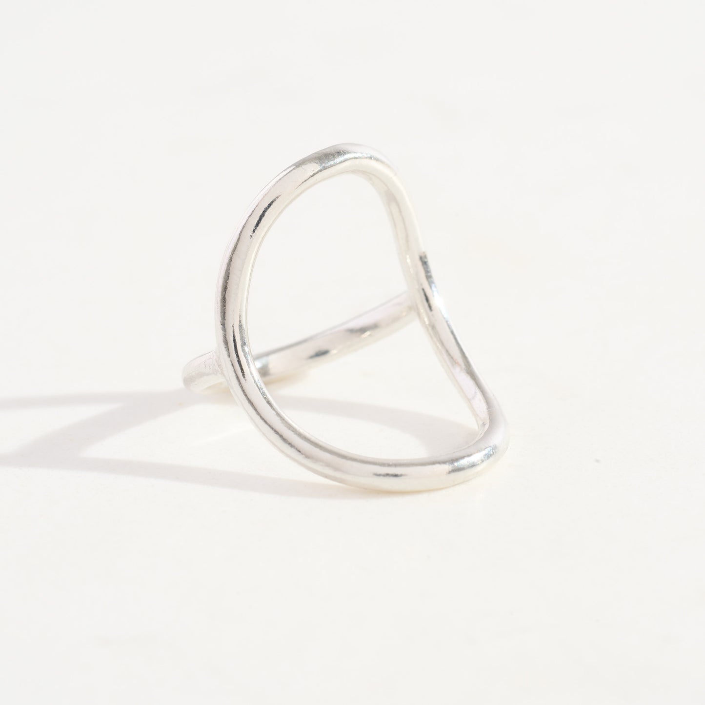Silver circle ring on a white background