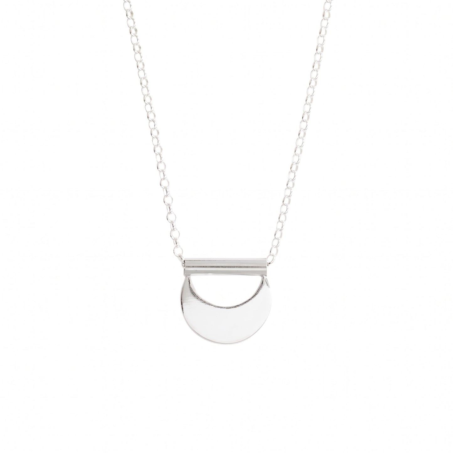 Silver necklace with a half-circle pendant on a white background