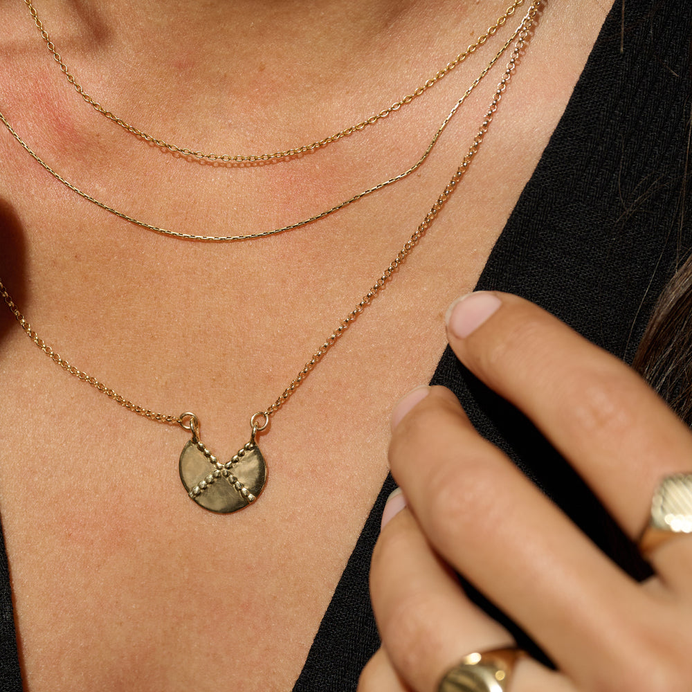 
                      
                        small_shield_pendant2
                      
                    