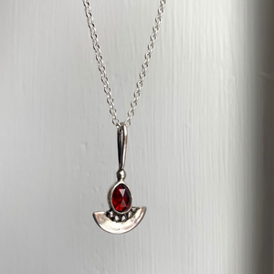 
                  
                    Garnet Shield Pendant  | Silver
                  
                