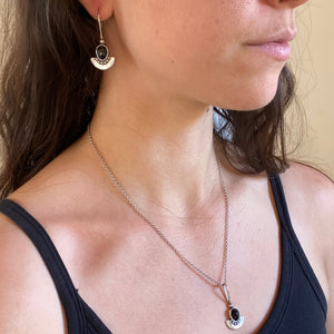 
                  
                    Onyx Shield Earrings
                  
                