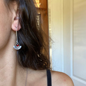 
                  
                    Garnet Shield Earrings  | Silver
                  
                