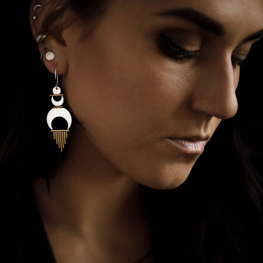 
                  
                    The Alchemy Earrings worn with the Shatki Studs to show how these statement earrings look with a second piercing. 
                  
                