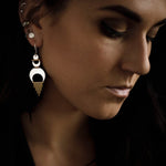 The Alchemy Earrings worn with the Shatki Studs to show how these statement earrings look with a second piercing. 