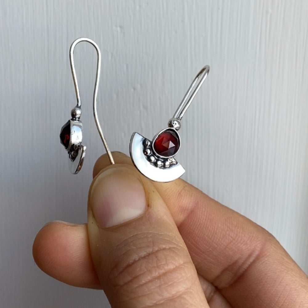 
                  
                    Garnet Shield Earrings  | Silver
                  
                