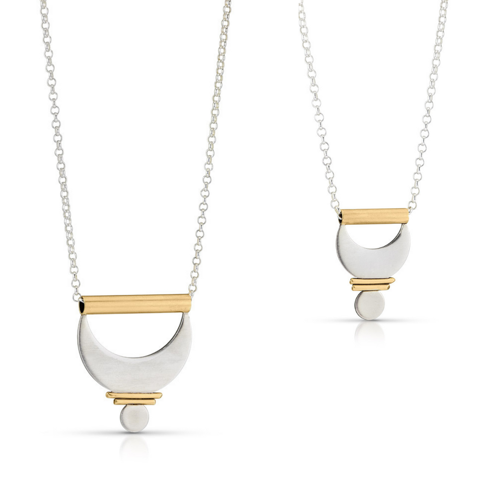 
                  
                    The Prana Pendants in both large and small shown side by side. 
                  
                