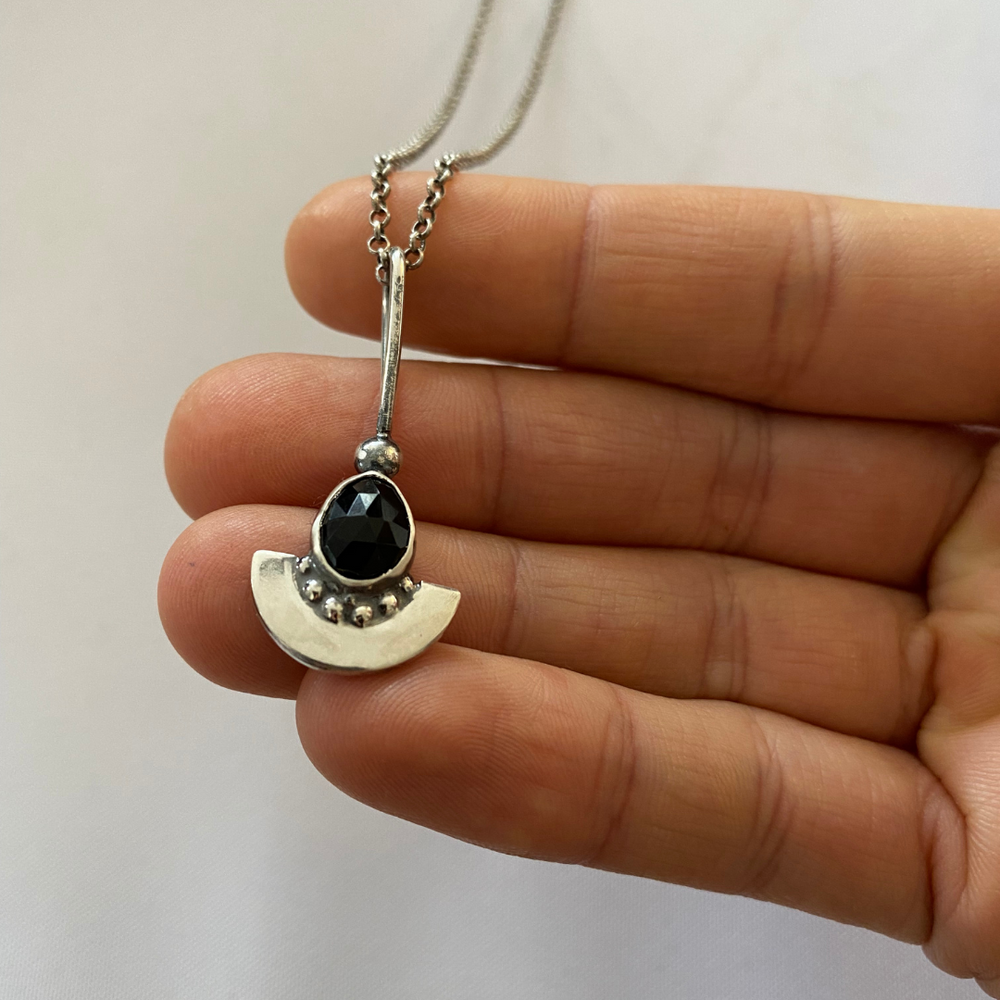 
                  
                    Onyx Shield Pendant | Silver
                  
                